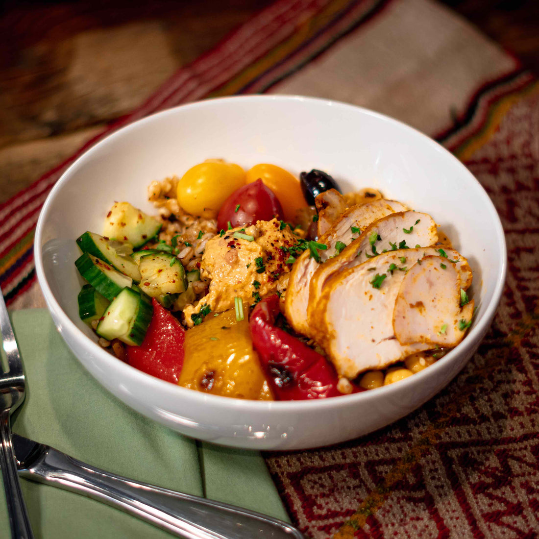 Mediterranean chicken bowl — a brain-healthy meal featuring olive oil, vegetables, and lean protein