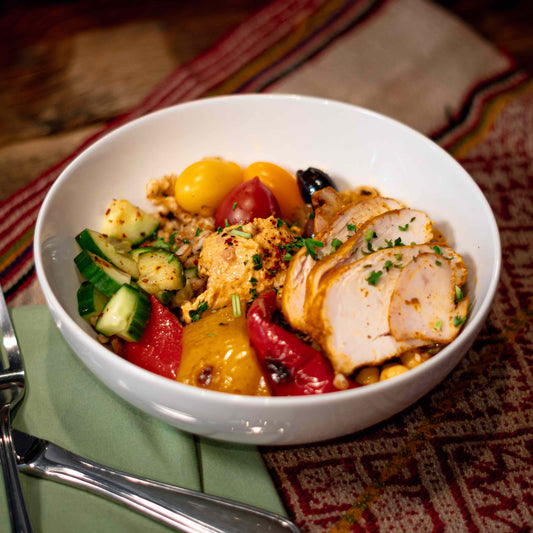 Mediterranean chicken bowl — a brain-healthy meal featuring olive oil, vegetables, and lean protein